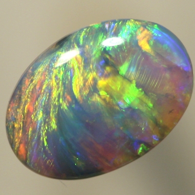 SOLID CRYSTAL OPAL Green and orange fire moves from side to side